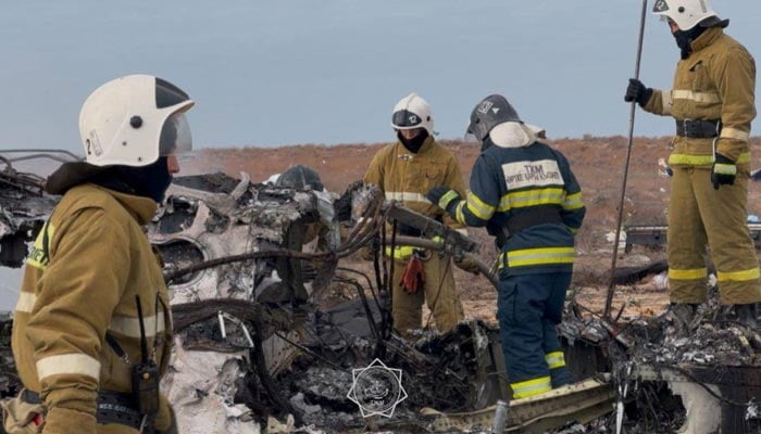 Emergency specialists work at the crash site of an Azerbaijan Airlines passenger plane near the city of Aktau, Kazakhstan December 25, 2024. — Reuters