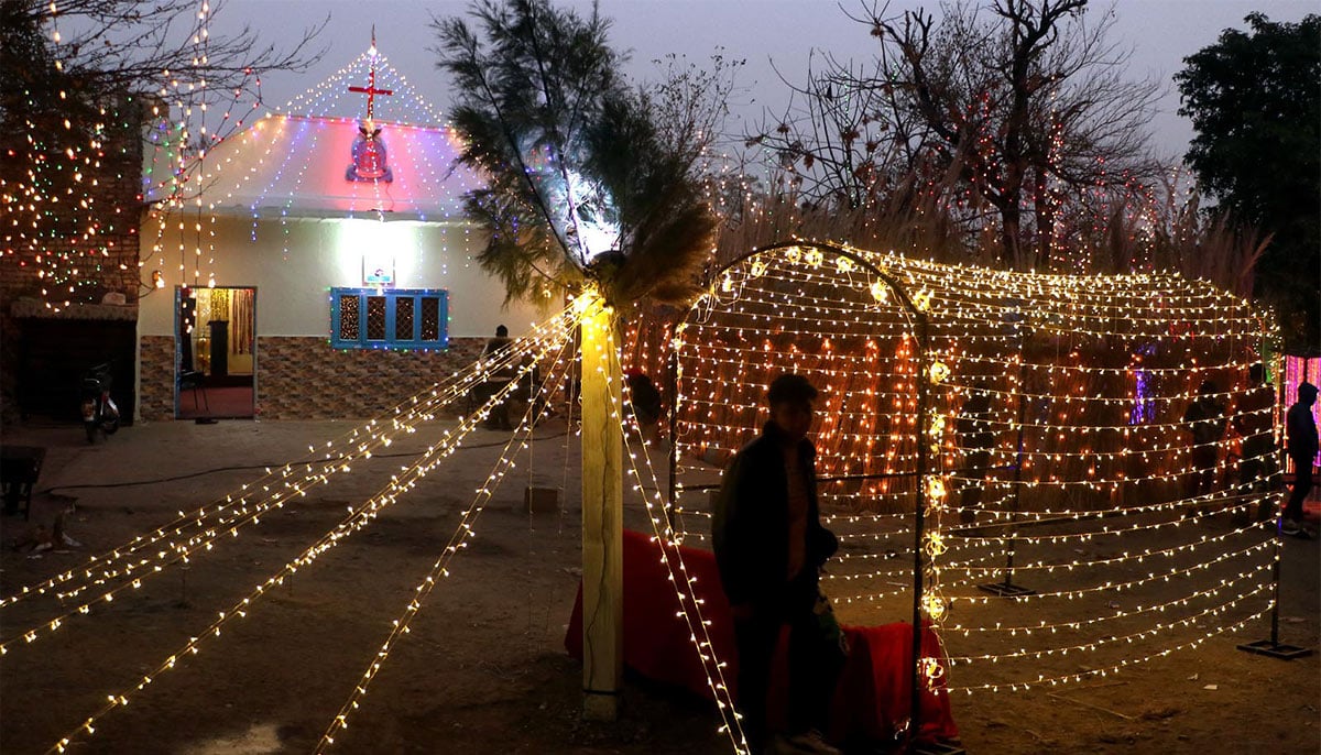 An illuminated view of church decoration with colorful lights at 100 Quarters on the eve of Christmas celebration on December, 24, 2024. — INP