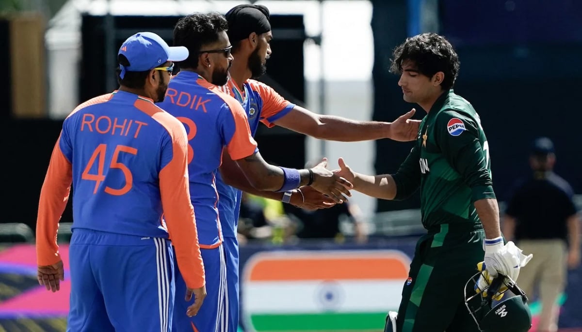 Indian players console a distraught Naseem Shah after the match between India and Pakistan during the ICC Mens T20 Cricket World Cup West Indies & USA 2024. — AFP