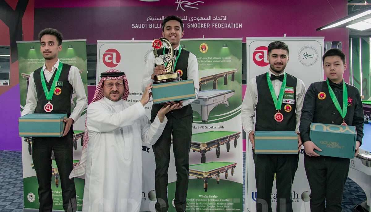 Pakistans Mohammad Hasnain receives trophy after winning the Asian U21 Snooker Championship title in Riyadh, Saudi Arabia. — Facebook/@acbsport/File