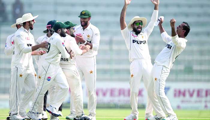 Spinner Noman Ali leads Pakistan celebrations during the second Test against England in Multan. — AFP/File