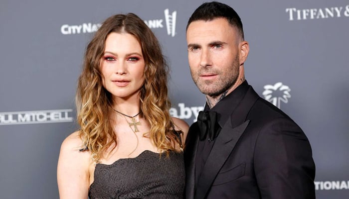 Behati Prinsloo shows loved up display with husband Adam Levine