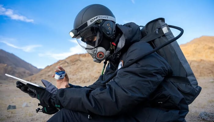 A team member of AAKA checking the oximeter as part of the ongoing research in Ladakh. — AAKA space studio/file