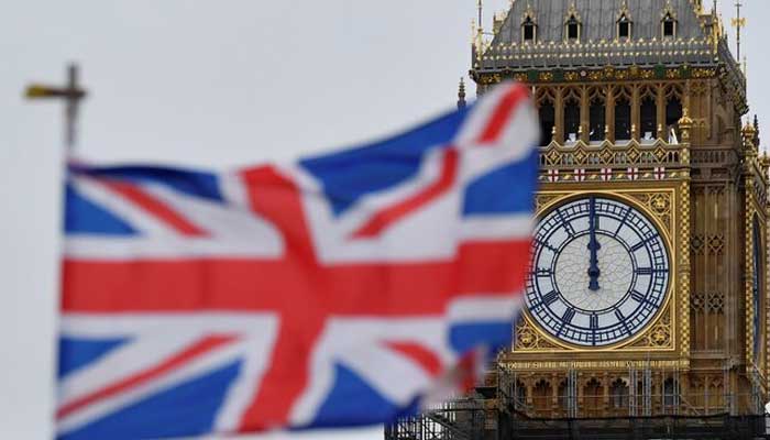 A clock face is seen at midday on Elizabeth Tower, more commonly known as the Big Ben, ahead of New Years Eve events at the Houses of Parliament, in London, Britain, December 29, 2021. — Reuters