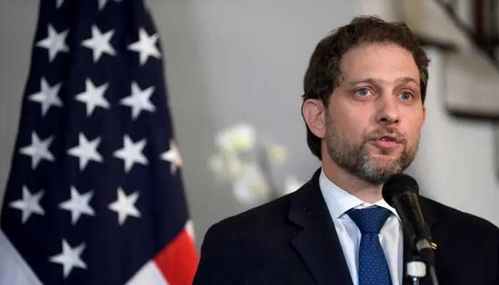 US Deputy National Security Advisor member of the US delegation, Jonathan Finer speaks during a press conference next to Colombias President-elect Gustavo Petro (out of frame) at the end of an official meeting in Bogota on July 22, 2022. — AFP