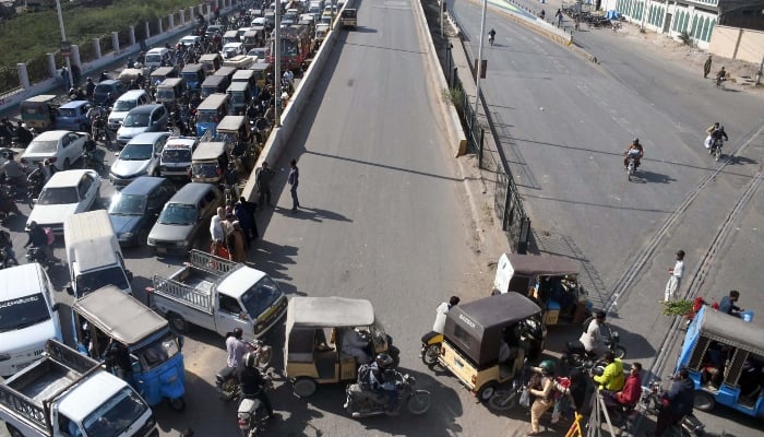 A view of massive traffic jam on the road leading to Gulistan-e-Johar from Sharea Faisal due to sit-in protest in Karachi on December 28, 2024. —Online