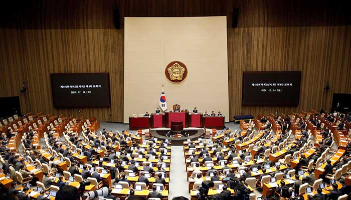 South Korean lawmakers during a plenary session of the impeachment vote of President Yoon Suk Yeol at the National Assembly in Seoul on Saturday, December14, 2024. — Reuters