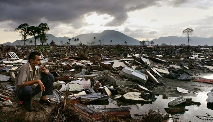 Tears, prayers as Asia mourns tsunami dead 20 years on