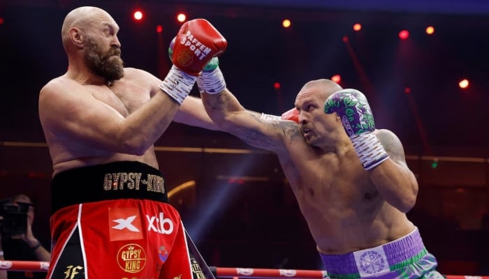 Ukraine’s Usyk triumphs over Fury to retain heavyweight titles