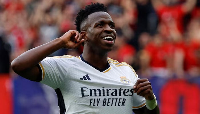 Real Madrids Vinicius Junior celebrates scoring their fourth goal during a LaLiga match against Osasuna at El Sadar Stadium in Pamplona, Spain on March 16, 2024. — Reuters