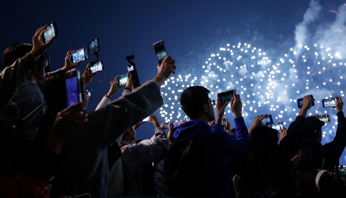 Fireworks explode over Victoria Harbour to celebrate the New Year in Hong Kong, January 1. — Reuters