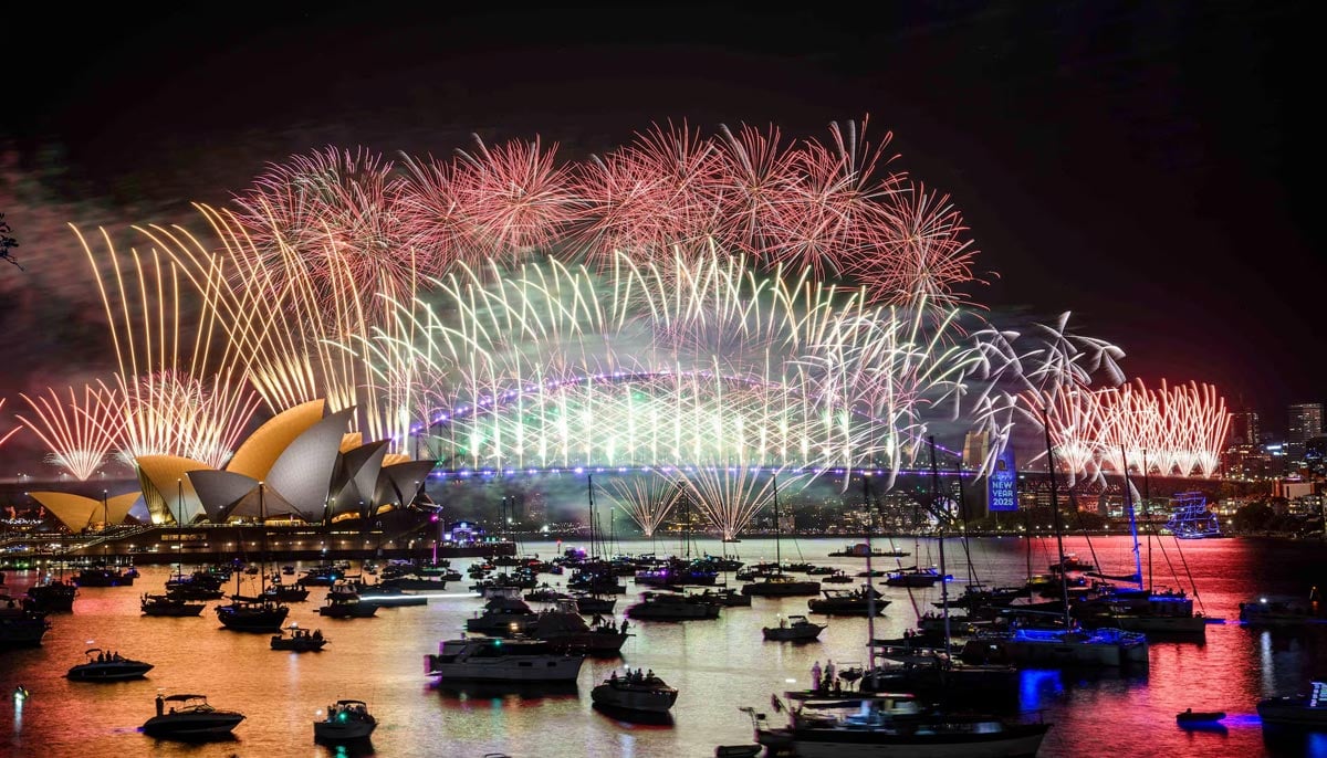 Fireworks explode over the Sydney Opera House and Harbour Bridge during New Year’s Eve celebrations in Sydney, Australia, December 31. — Reuters via AAP