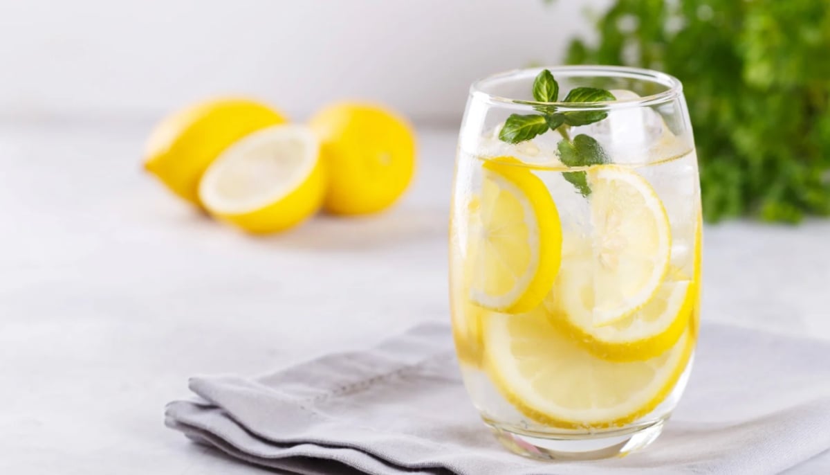 A representational image of a glass of lemon water. — Canva