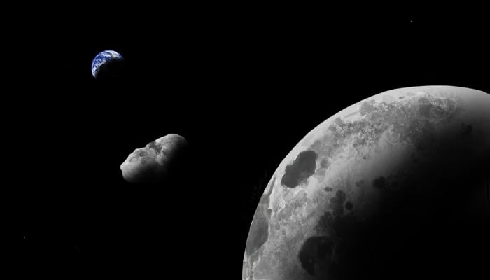 The 469219 Kamooalewa asteroid pictured between the Earth and the moon. — X/@AsteroidWatch/File