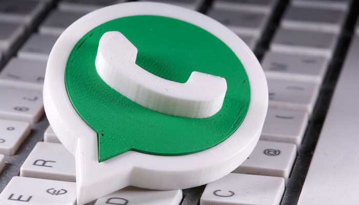 A 3D printed WhatsApp logo is placed on the keyboard in this illustration taken April 12, 2020. — Reuters